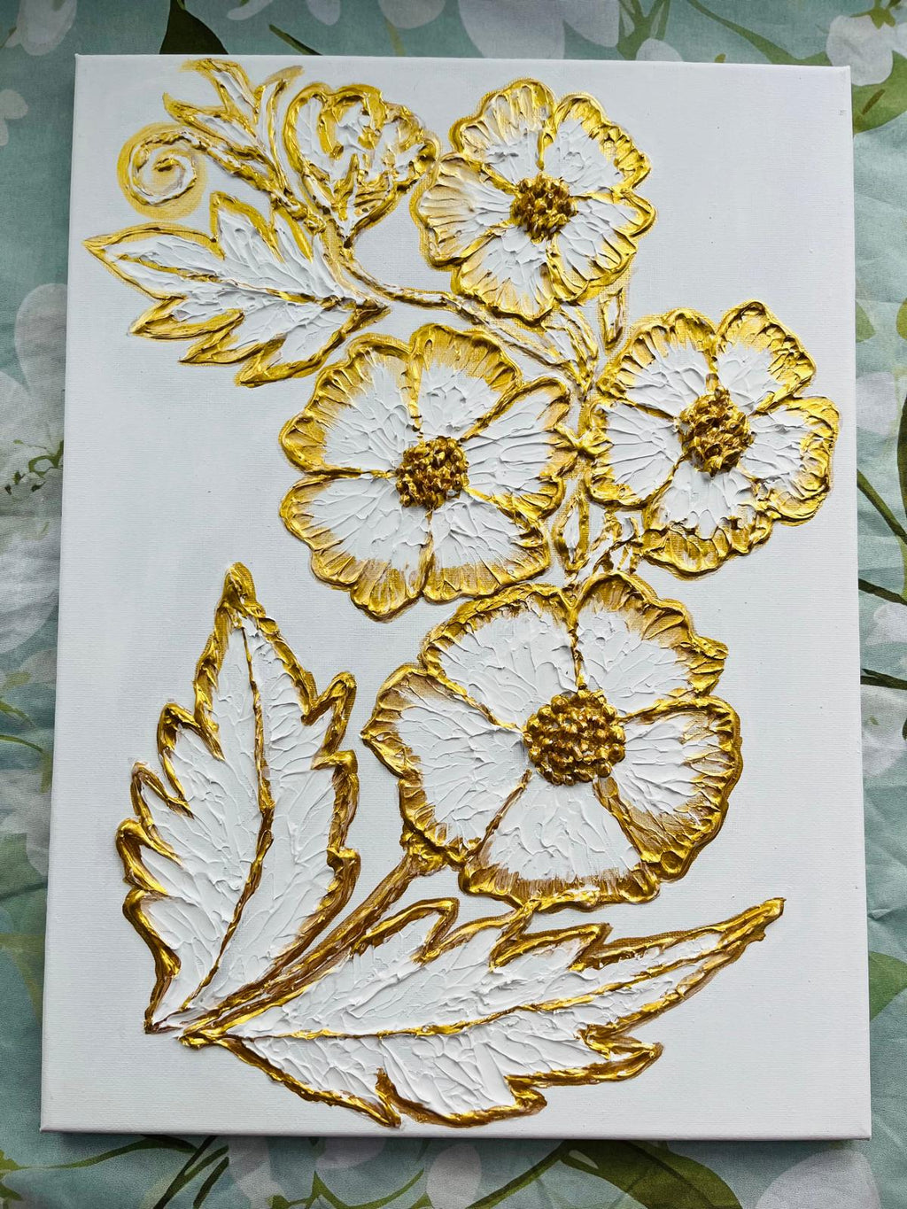 3D canvas adorned with elegant golden flowers, each meticulously hand-painted.